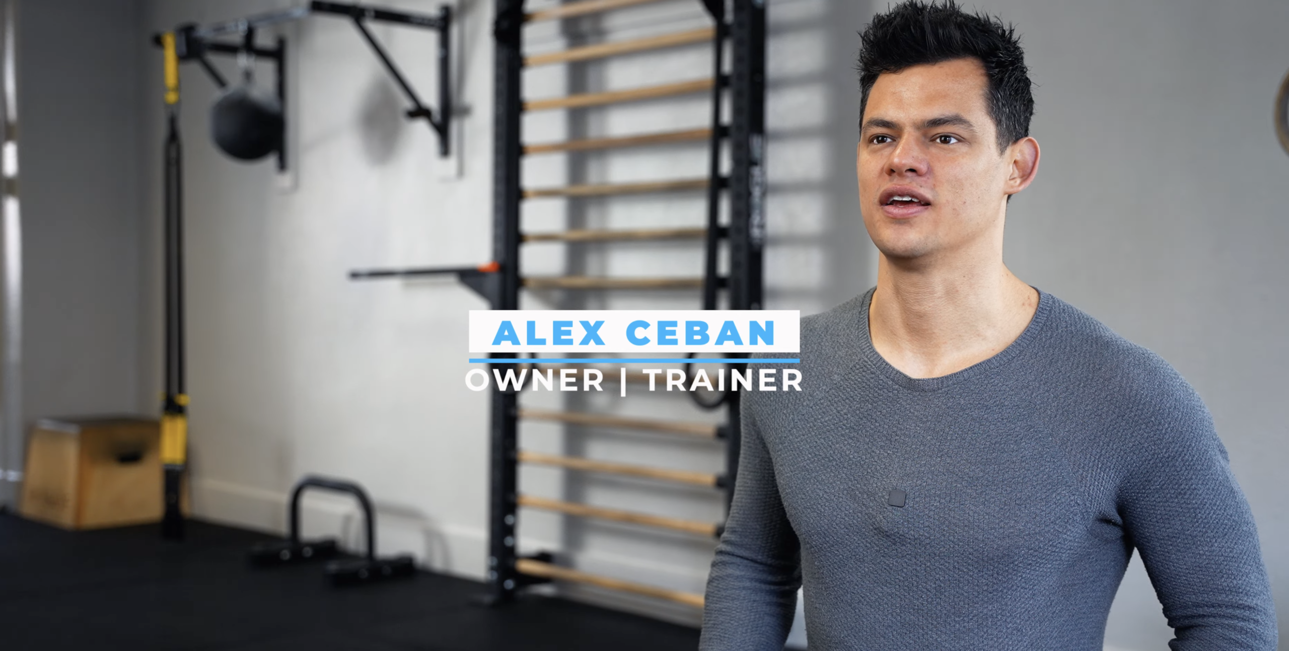 Alex Ceban speaking inside a Capra Bodyweight Training studio