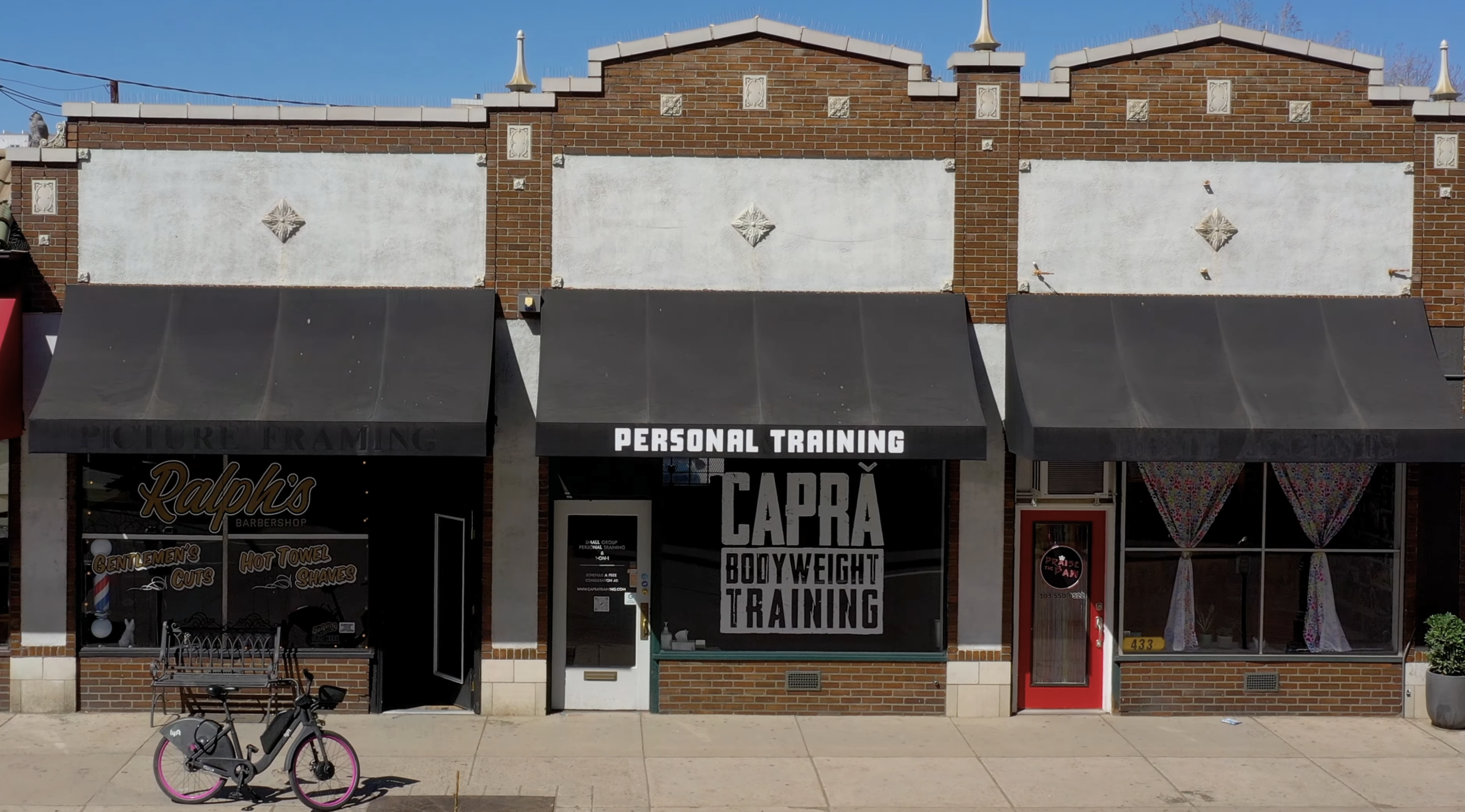Capra Bodyweight Training storefront beneath a personal training awning
