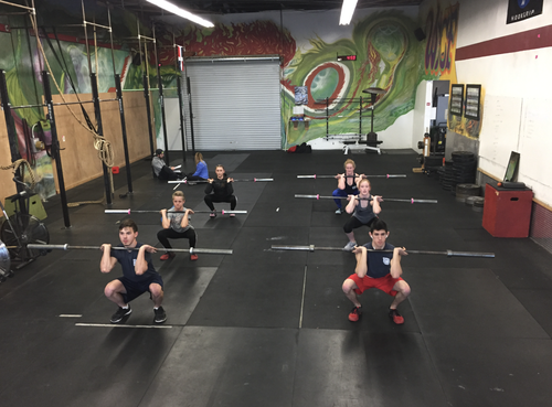 Wine Country CrossFit group class practicing barbell movement in Napa California