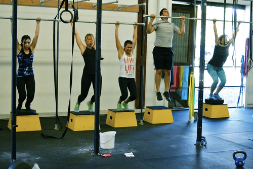 Wine Country CrossFit members practicing barbell and strength movement in Napa California